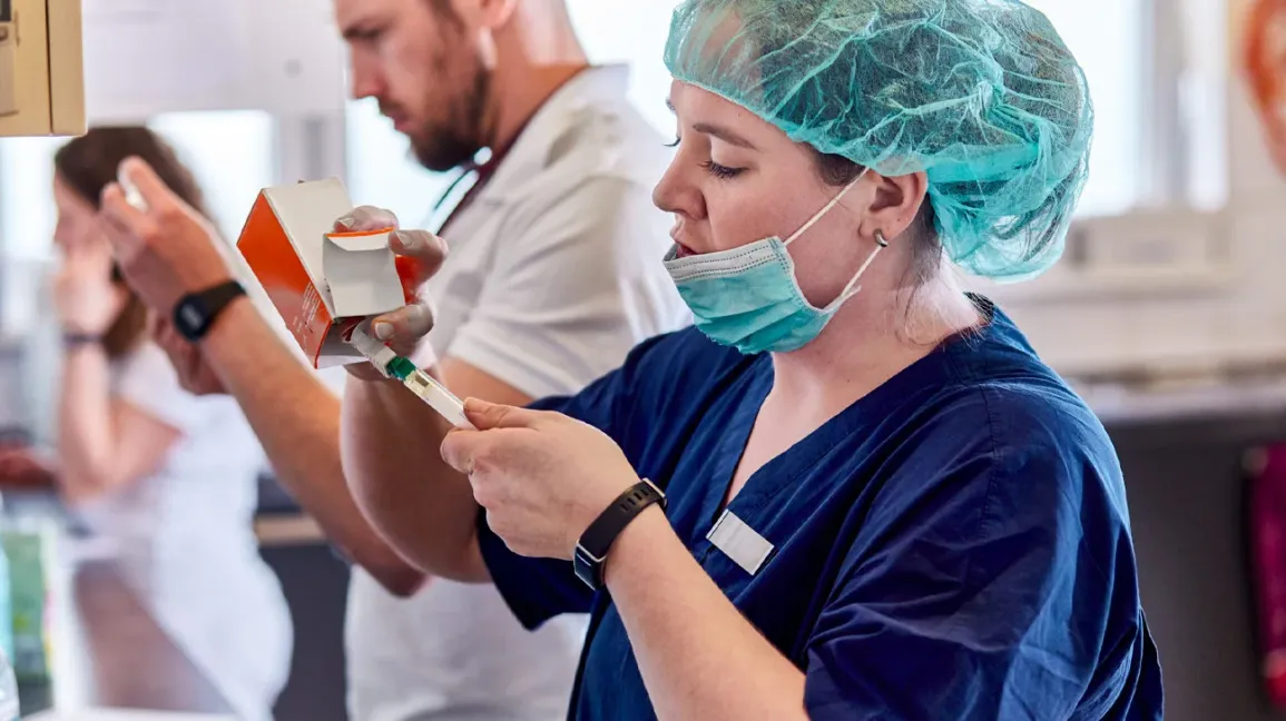 Nurse-preparing-a-syringe-in-animal-hospital-1296x728-header-1296x728